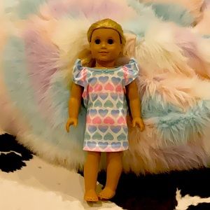 I am selling a used American girl doll